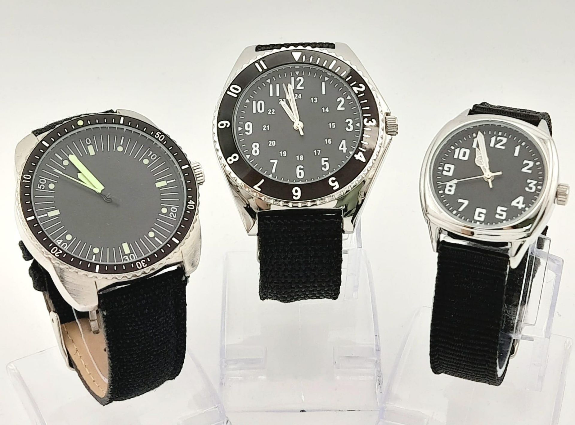 Three Military design Homage Watches Comprising; 1) Canadian Airforce Navigator Watch (45mm Case),