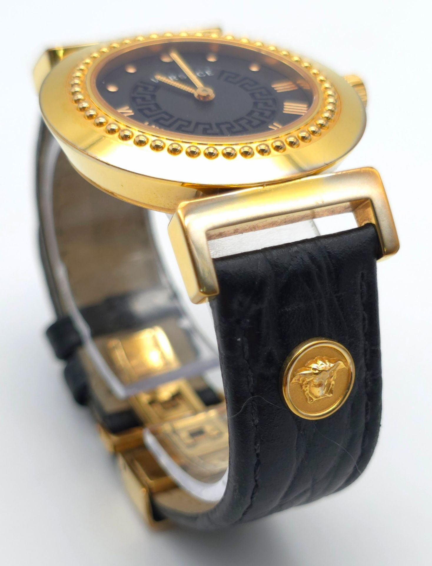 A Versace Designer Quartz Ladies Watch. Black leather and gilded strap and case - 35mm. Black dial - Image 6 of 8