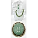 A Suite of Jade Jewellery. Includes bead necklace, earrings and brooch.