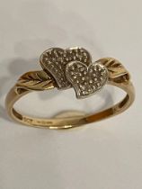 Unusual and interesting 9 carat GOLD RING with 2 x DIAMOND ENCRUSTED HEARTS mounted to top.