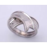 A TIFFANY & CO STERLING SILVER RIBBON RING. Size J, 3.4g weight. Ref: SC 8097