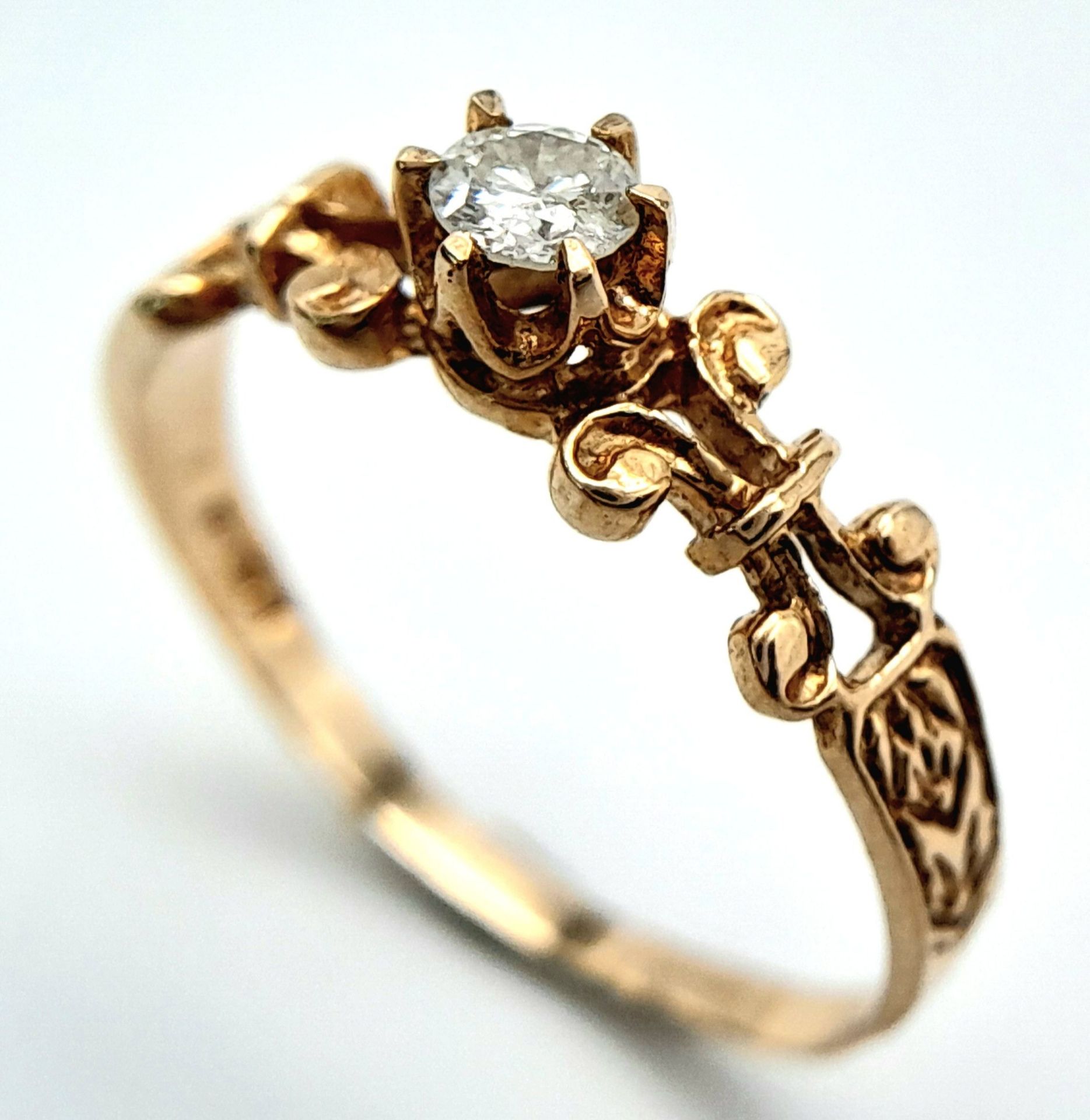 A 9K YELLOW GOLD FANCY DIAMOND SOLITAIRE RING. 0.15CT. 1.3G. SIZE N - Image 3 of 6