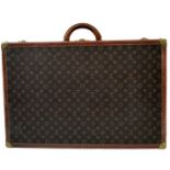 A Vintage Possibly Antique Louis Vuitton Suitcase. The last lot of our LV trilogy. Canvas monogram