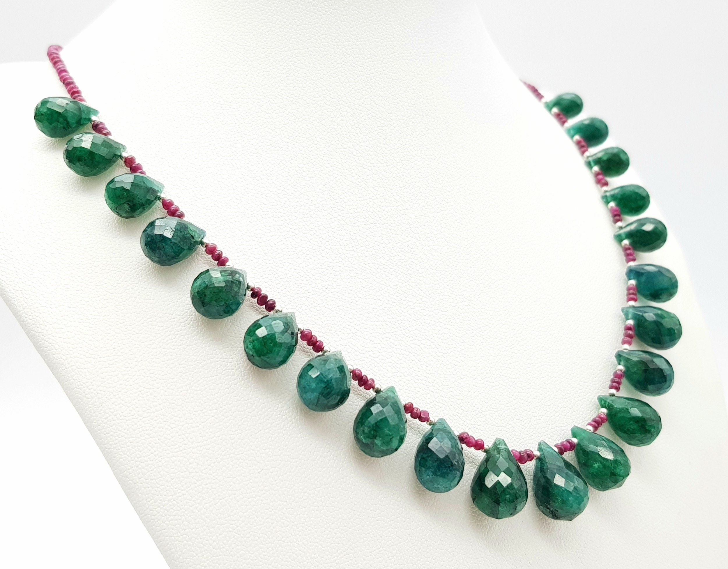A 160ctw Emerald Teardrop Necklace with Ruby Spacer Beads And a Pair Matching Drop Earrings. 44cm - Image 3 of 5