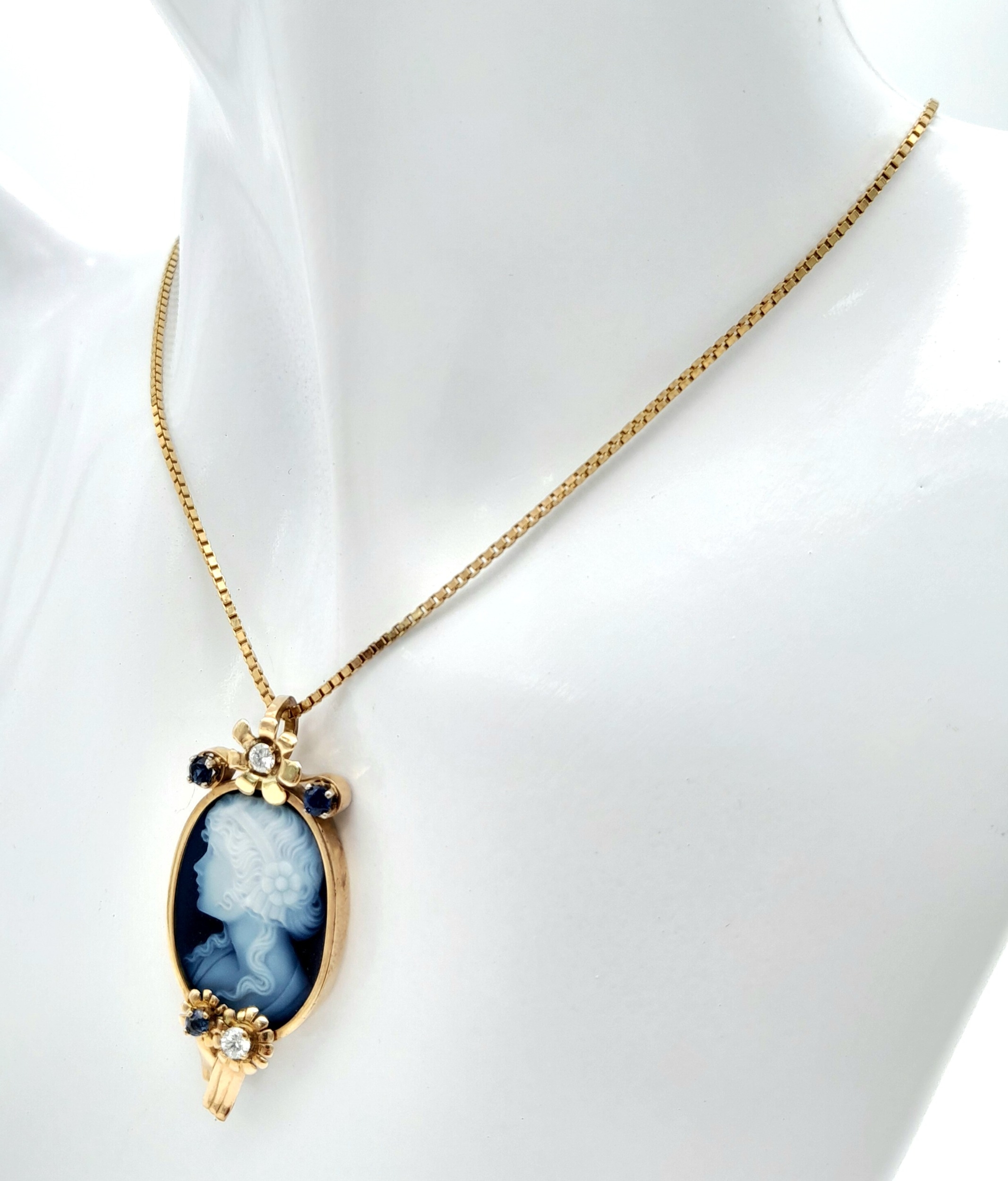 A Beautiful 9K Gold, Cameo Pendant with Sapphire and Diamond decoration on a 9K link chain. - Image 2 of 6