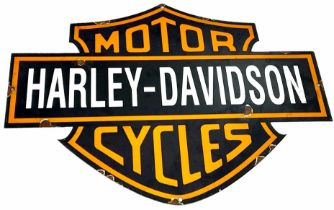 A Vintage Repro Harley Davidson Die-Cut Enamel sign. In good condition - a few small rust marks