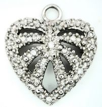 A 9K WHITE GOLD DIAMOND SET HEART PENDANT/CHARM. 1.6cm length, 1.4g total weight. Ref: SC 8020