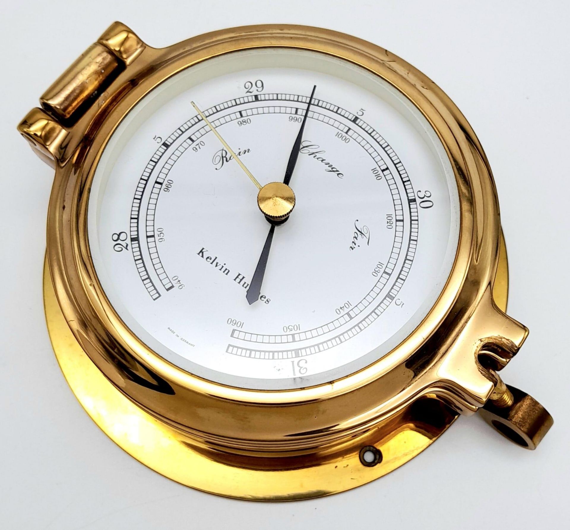 A Nautical, polished brass, KELVIN HUGHES barometer, having the shape of a ship-cabin’s porthole, - Image 3 of 7