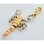 A 14K 3 COLOUR ARTICULATED SCORPION CHARM. 3.5cm length, 3g total weight. Ref: SC 8050