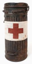WW2 German Medics Gas Mask Canister. Genuine Period Medics Armband tied around the tin. Traces of