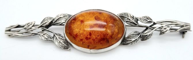 A Vintage Silver Amber Cabochon Brooch. 9cm.