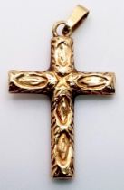 An attractive 9k yellow gold detailed cross pendant, weight 1.1g