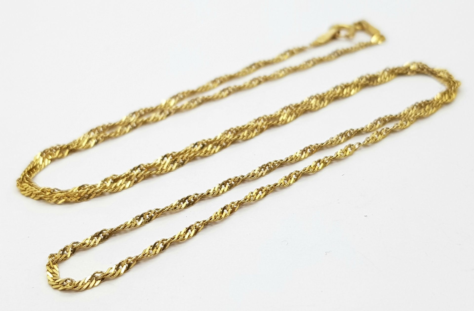 A 9K Yellow Gold Small Twist Curb Link Necklace. 44cm. 1.75g - Image 2 of 5