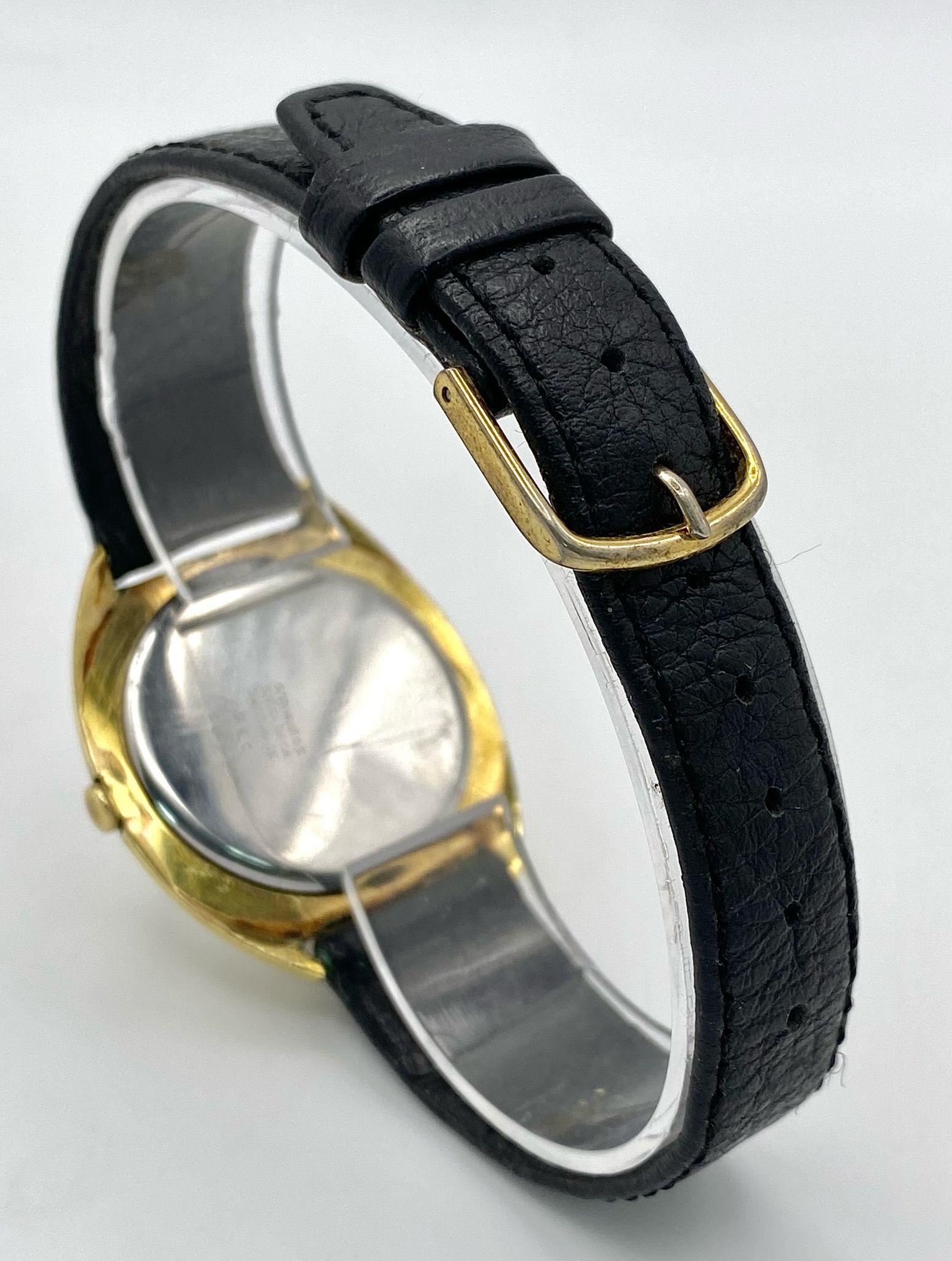 A Vintage 17 Jewels Delvina Mechanical Gents Watch. Black leather strap. Gilded case - 36mm. - Image 5 of 7