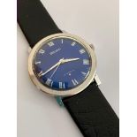 Gentlemans vintage SEIKO 66- 7090 wristwatch. Blue Face Model with Roman numerals. Manual winding in