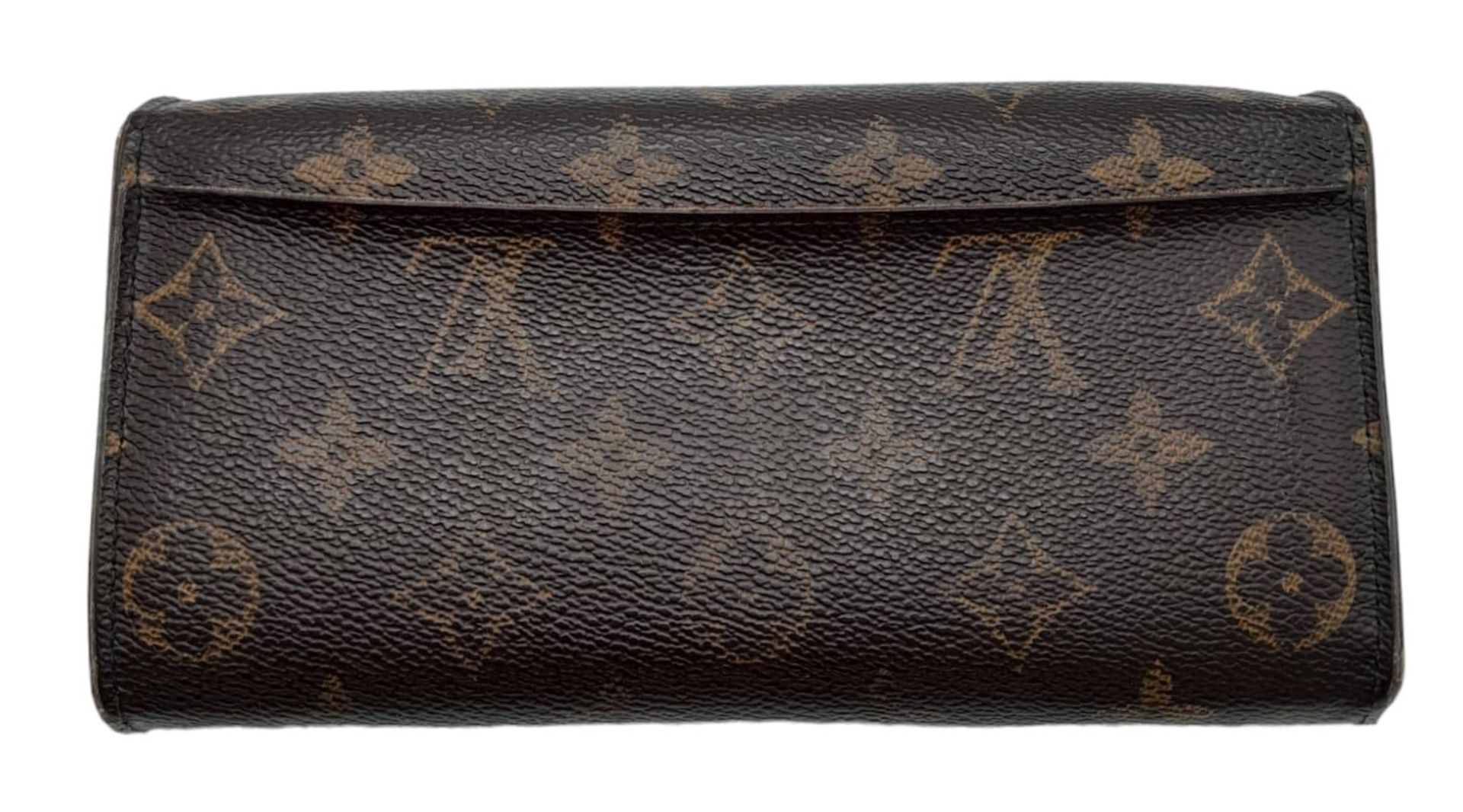A Louis Vuitton Monogram Wallet. Leather exterior with an open compartment on back and press stud - Bild 2 aus 10