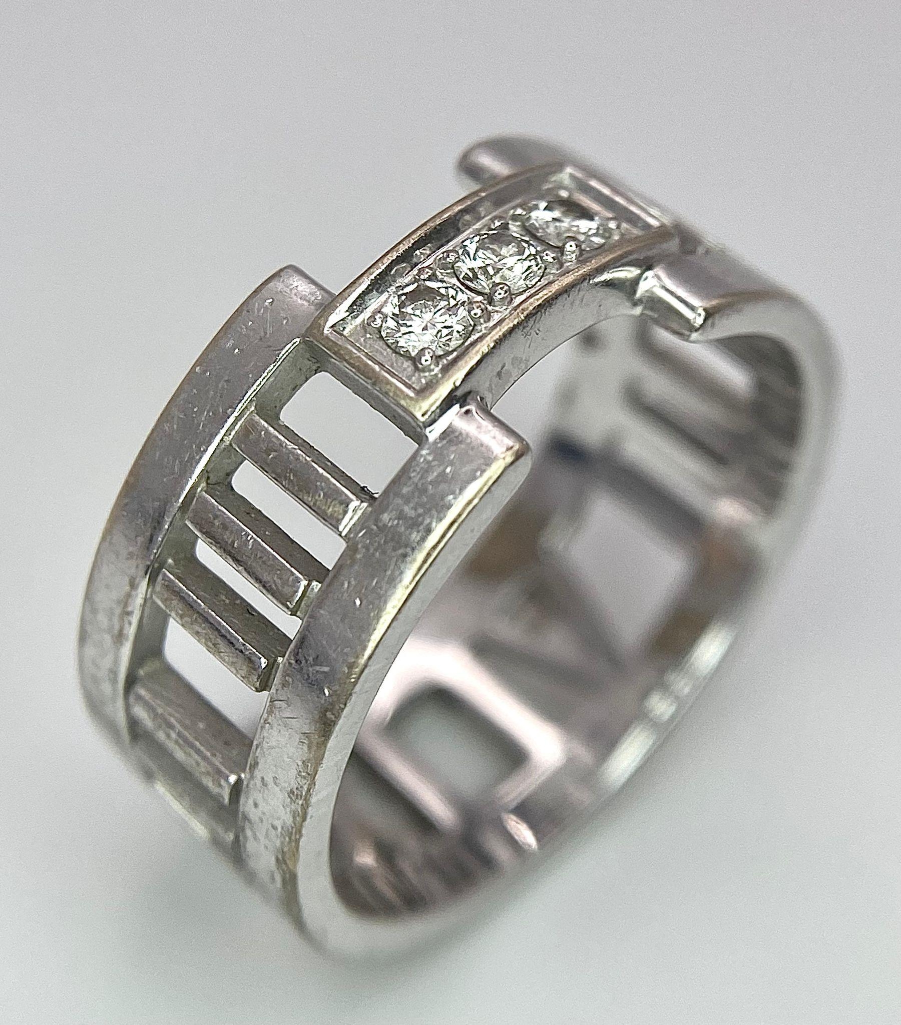 An 18K White Gold Tiffany Atlas Diamond Ring. Pierced Roman numeral decoration. Tiffany mark. Size - Image 3 of 9