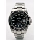 A Rolex Submariner Date Automatic Gents Watch. Stainless steel bracelet and case - 41mm. Black
