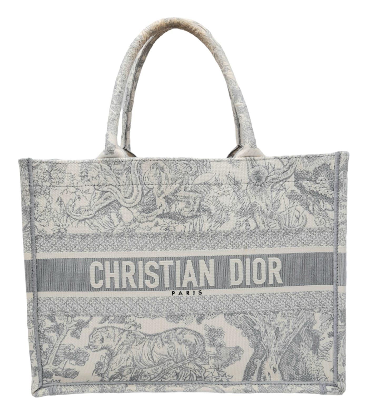 A Christian Dior small toile de jouy book tote bag, grey/white embroidery, top handles. Size approx.