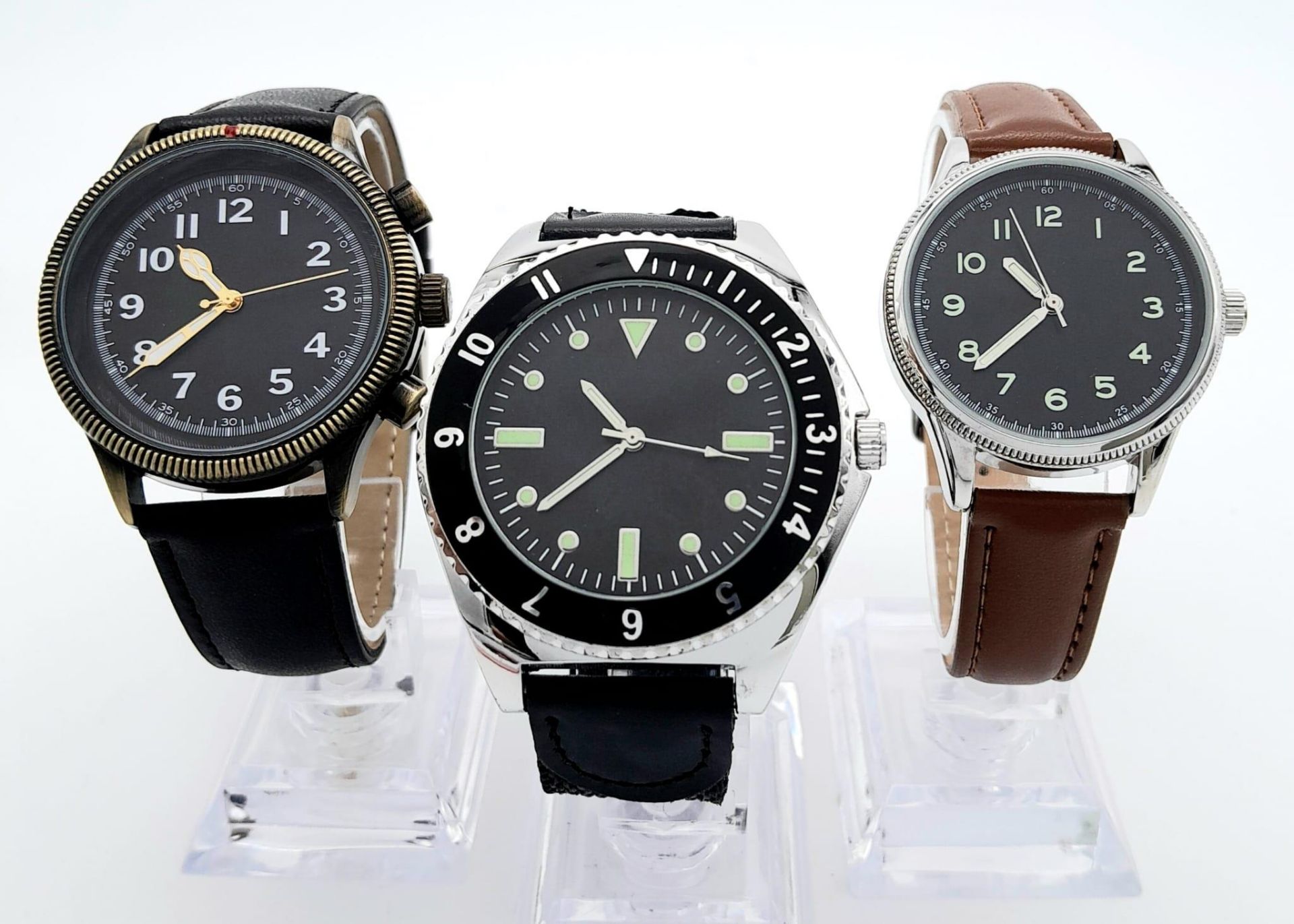 Three Unworn Military Homage Watches Comprising; 1) A 1970’s Design US Navy Diver Watch (45mm Case),