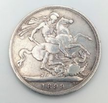 An 1899 Queen Victoria Silver Crown Coin. VF grade but please see photos.