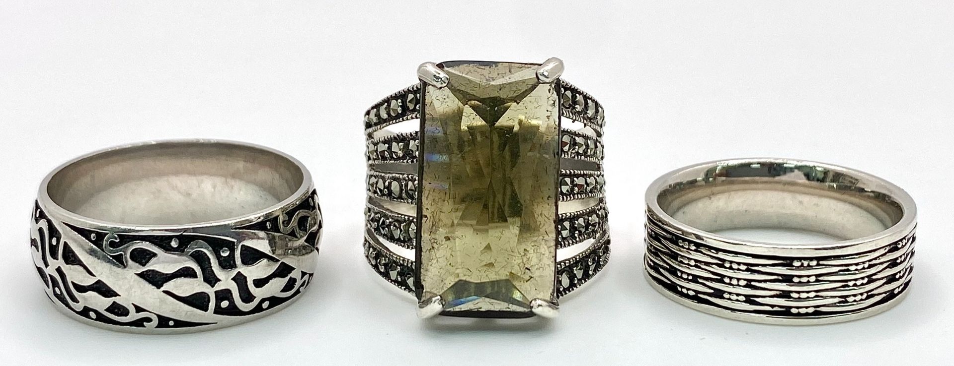 Three Different Style 925 Silver Rings. Sizes: 2 x R, 1 x U.