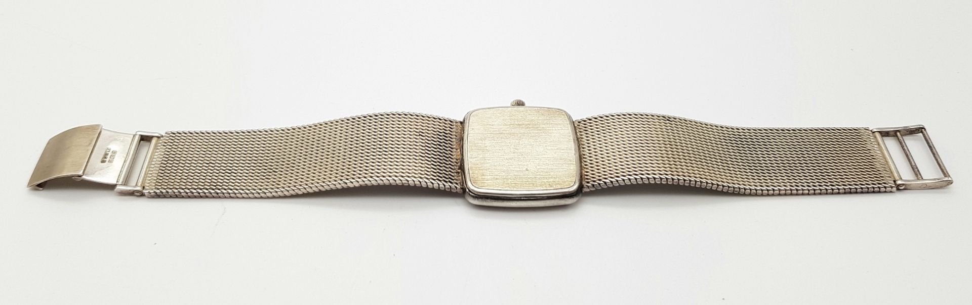 A Rare Garrard Sterling Silver Gents Quartz Watch. Sterling silver bracelet and case - 29mm. White - Image 7 of 8