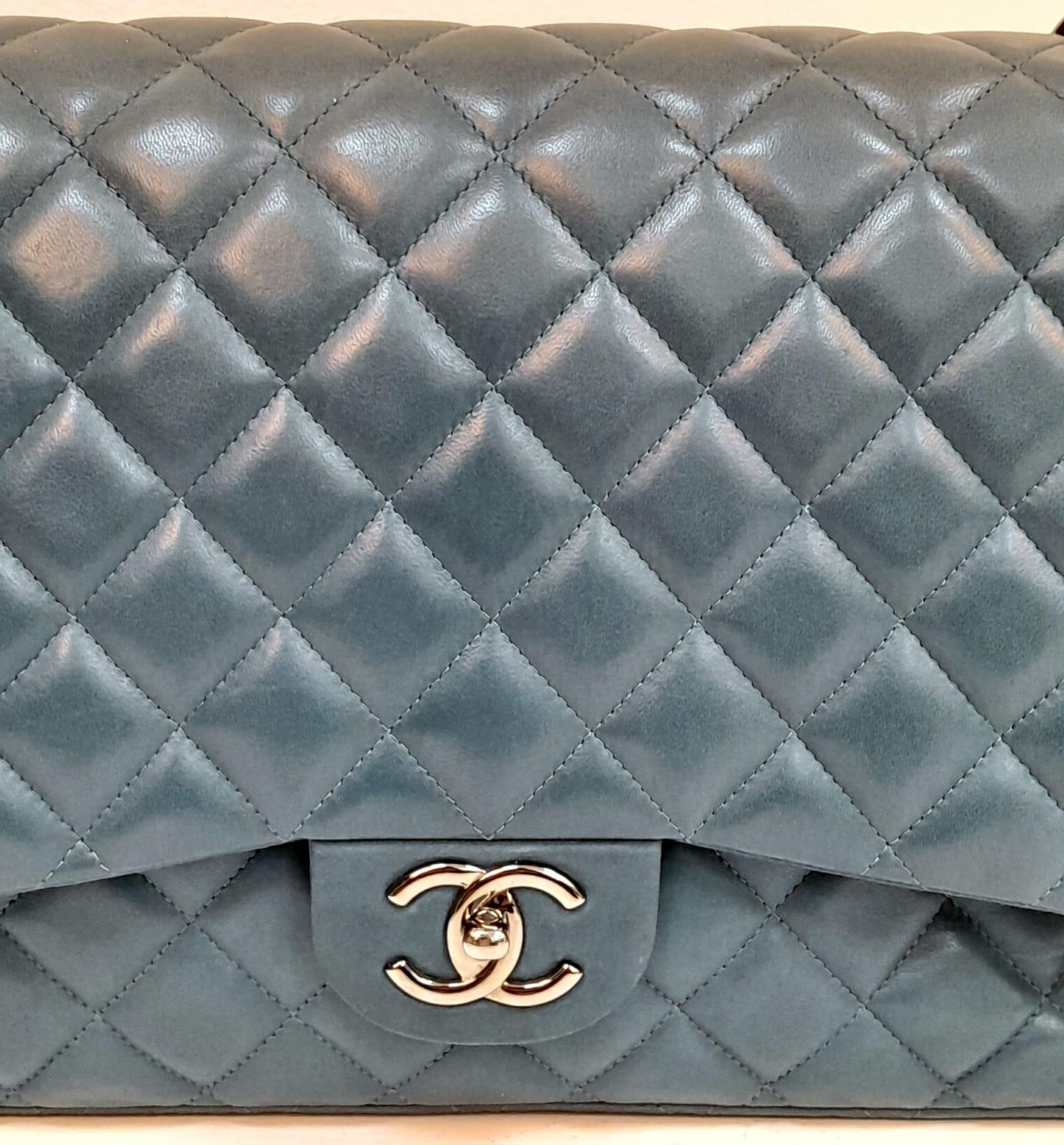 A Chanel Teal Jumbo Classic Double Flap Bag. Quilted leather exterior with silver-toned hardware, - Image 2 of 14