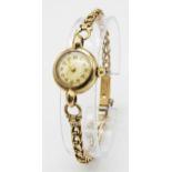 A Vintage 9K Yellow Gold Renown Ladies Watch. 9K gold bracelet and case - 18mm. Patinaed dial.