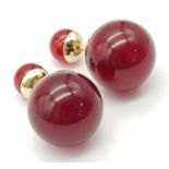 A Pair of Dior Cherry Red Orb Earrings. Comes in Dior packaging.
