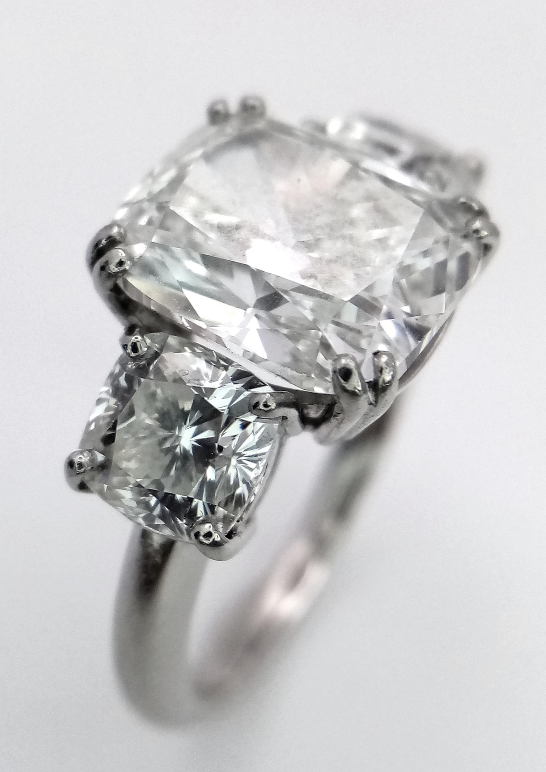 A Breathtaking 4.01ct GIA Certified Diamond Ring. A brilliant cushion cut 4.01ct central diamond - Image 6 of 22