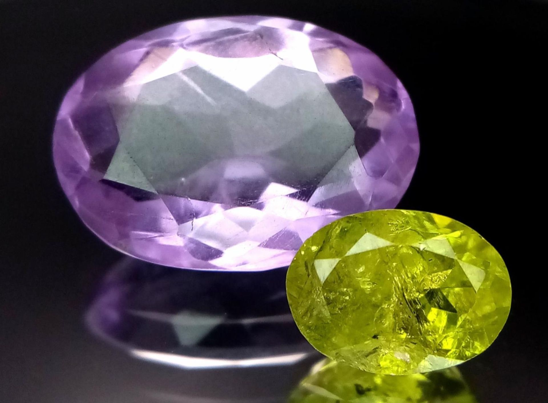 Set of 2 Gems - Peridot of 1.86ct and Amethyst 6.55ct - Both with GFCO certs.