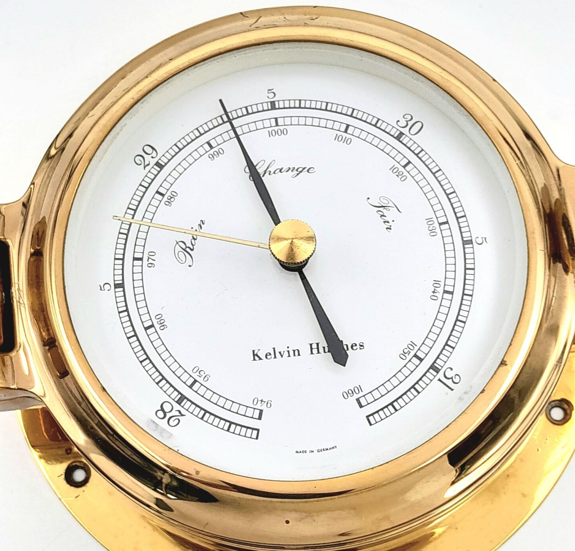 A Nautical, polished brass, KELVIN HUGHES barometer, having the shape of a ship-cabin’s porthole, - Bild 2 aus 7