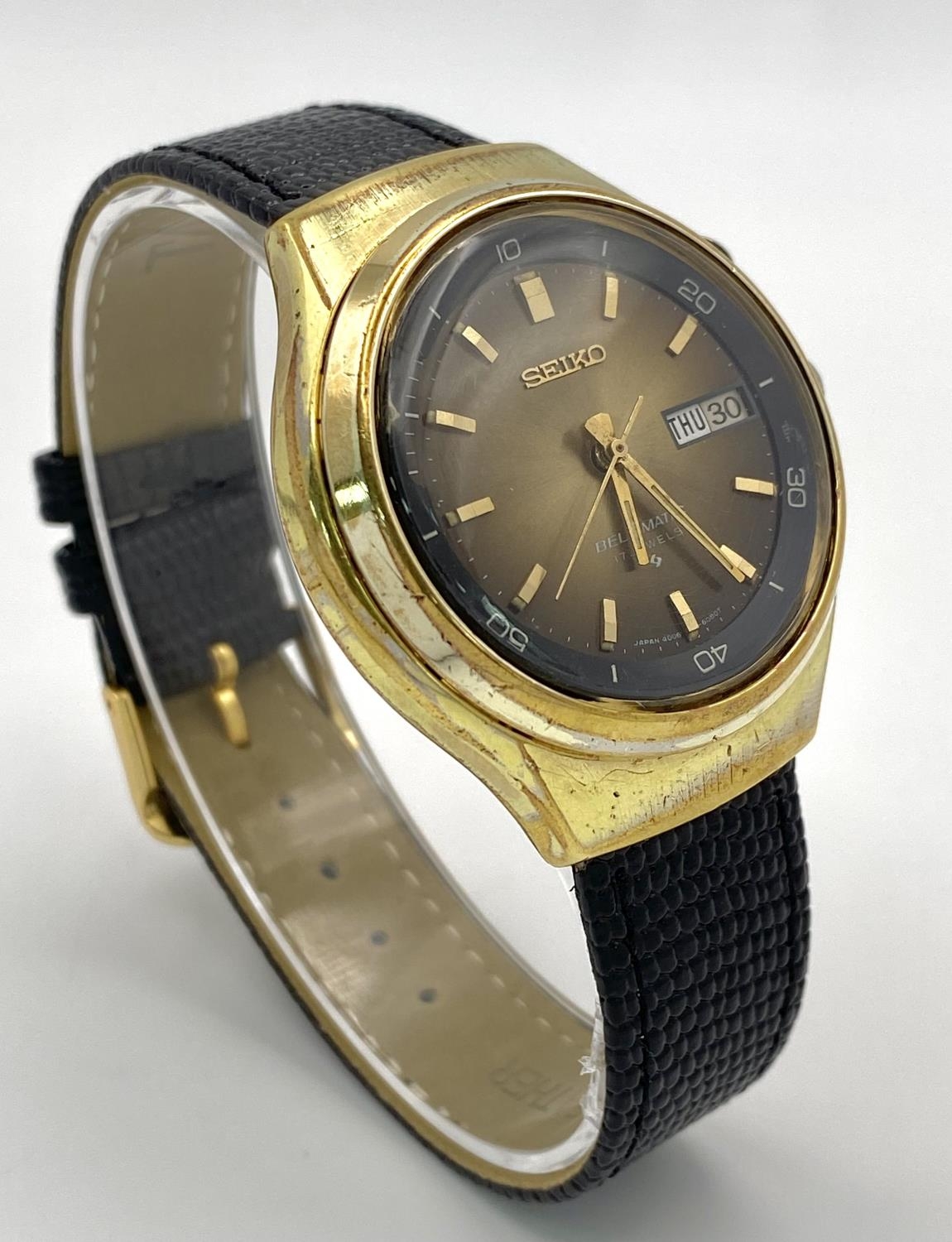 A Vintage Seiko Bell-Matic 17 Jewels Automatic Gents Watch. Black leather strap. Gilded case - 38mm. - Image 6 of 8