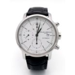 A Baume and Mercier Automatic Gents Watch. Black leather strap. Stainless steel case - 42mm. White