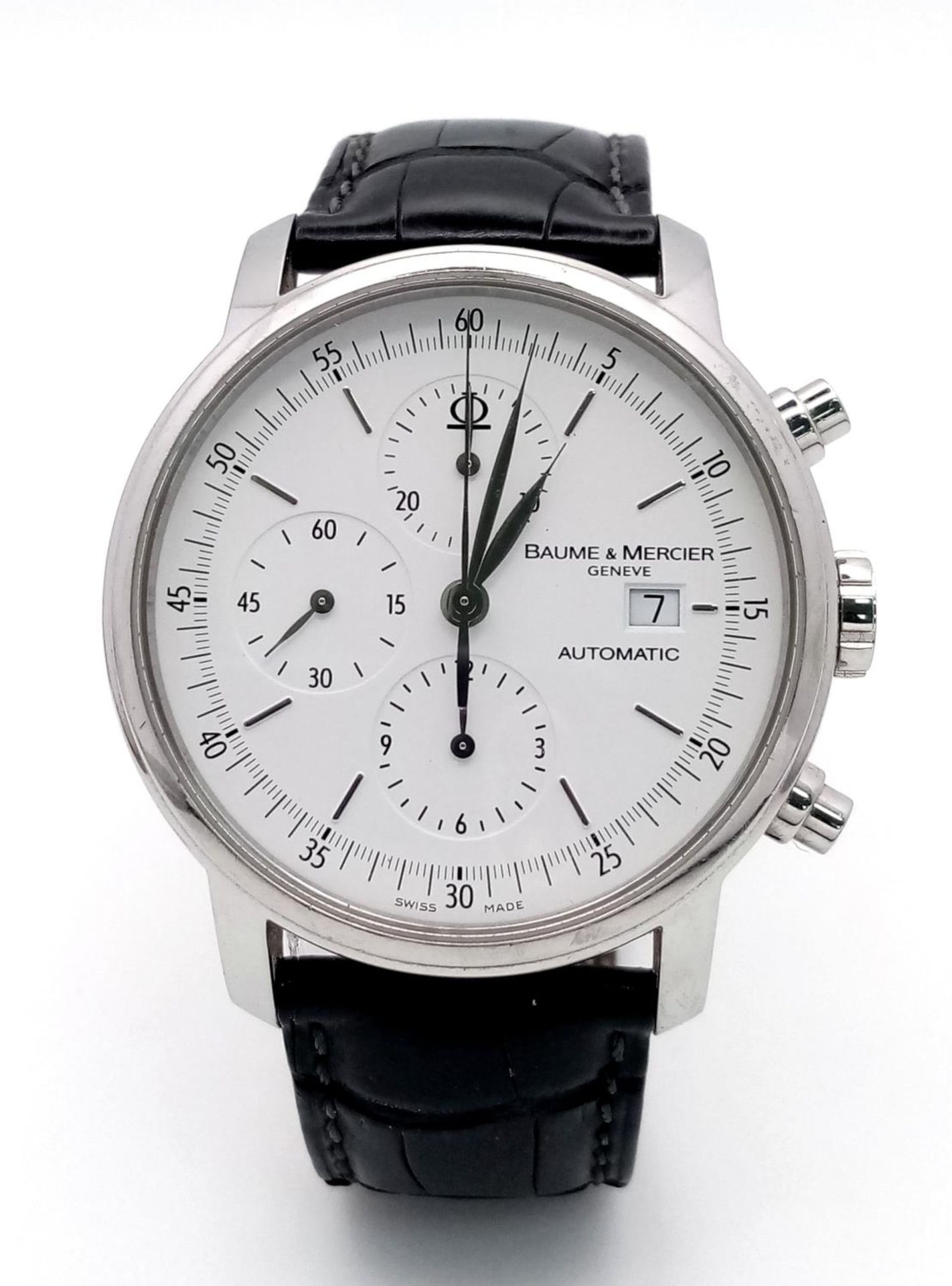 A Baume and Mercier Automatic Gents Watch. Black leather strap. Stainless steel case - 42mm. White