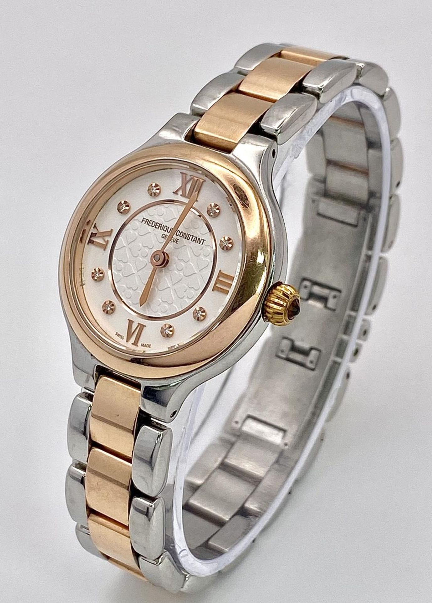 A Frederique Constant Quartz Ladies Watch. Two tone bracelet and case - 28mm. White stone set