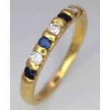 AN 18K YELLOW GOLD DIAMOND & SAPPHIRE BAND RING. 0.15ctw, size M, 2.5g total weight. Ref: SC 9048