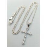 A 925 Silver Cross Pendant on a 925 Silver Chain. 3cm and 40cm.