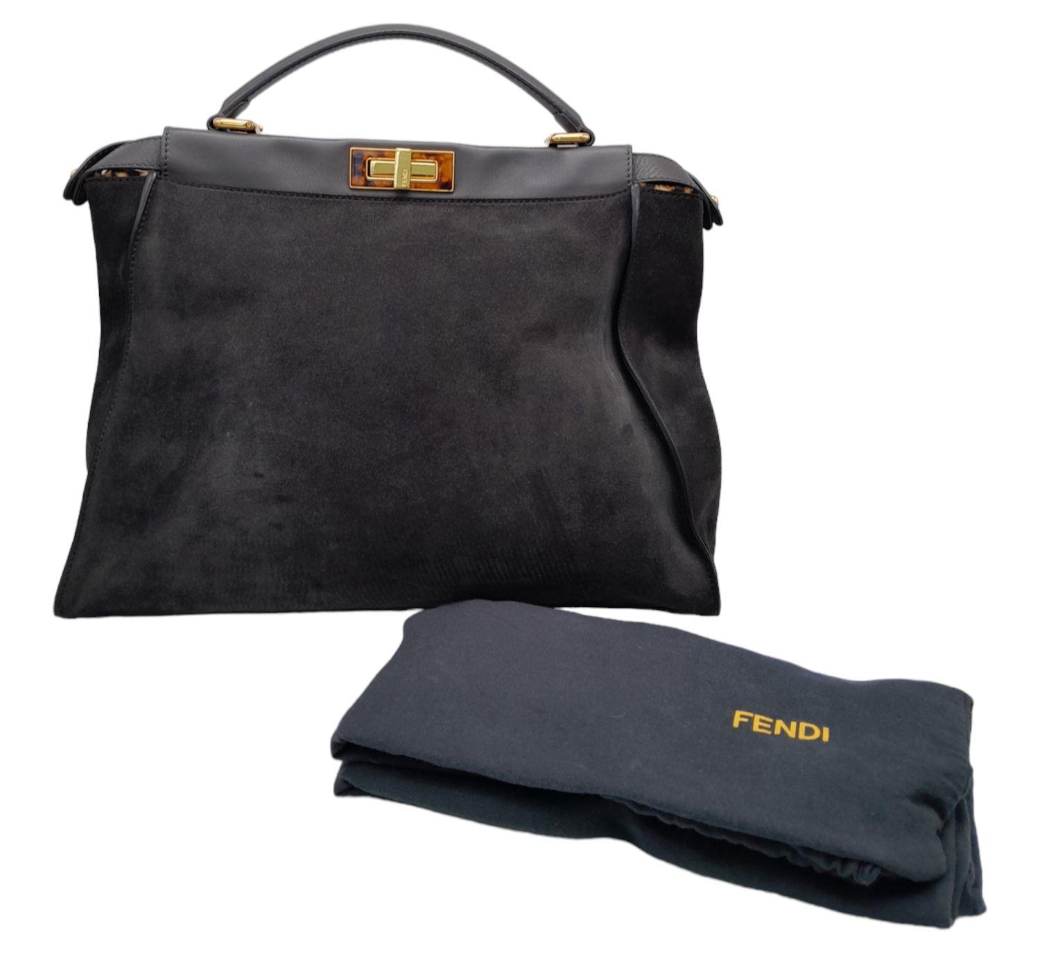 A Fendi Grey Peekaboo Bag. Suede exterior with leather trim, single leather handle, gold-toned - Image 3 of 9