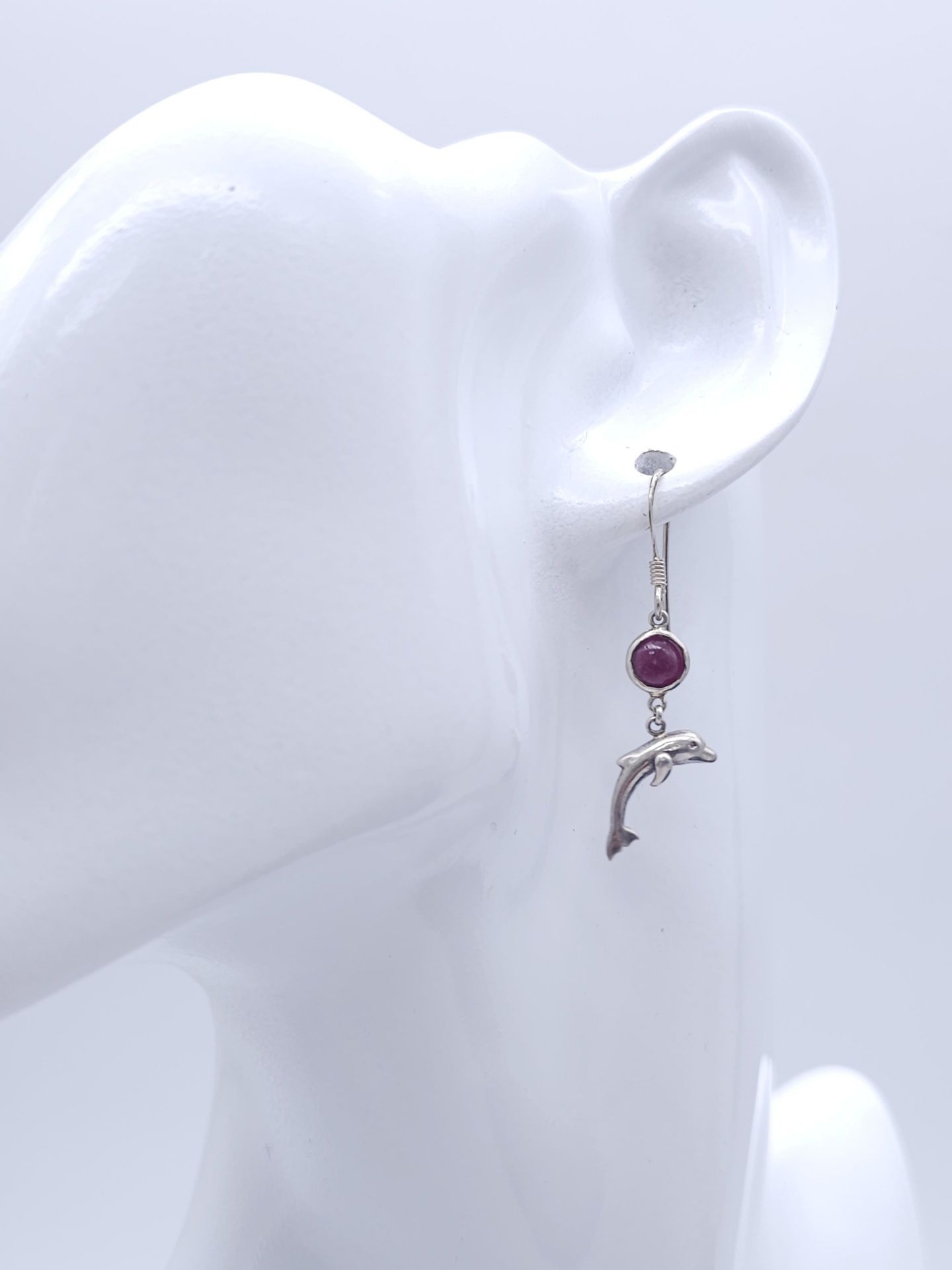 A Pair of Sterling Silver Ruby Set Dolphin Pendant Earrings. 2.5cm Drop. Set with 5mm Round Cut Ruby - Image 5 of 5