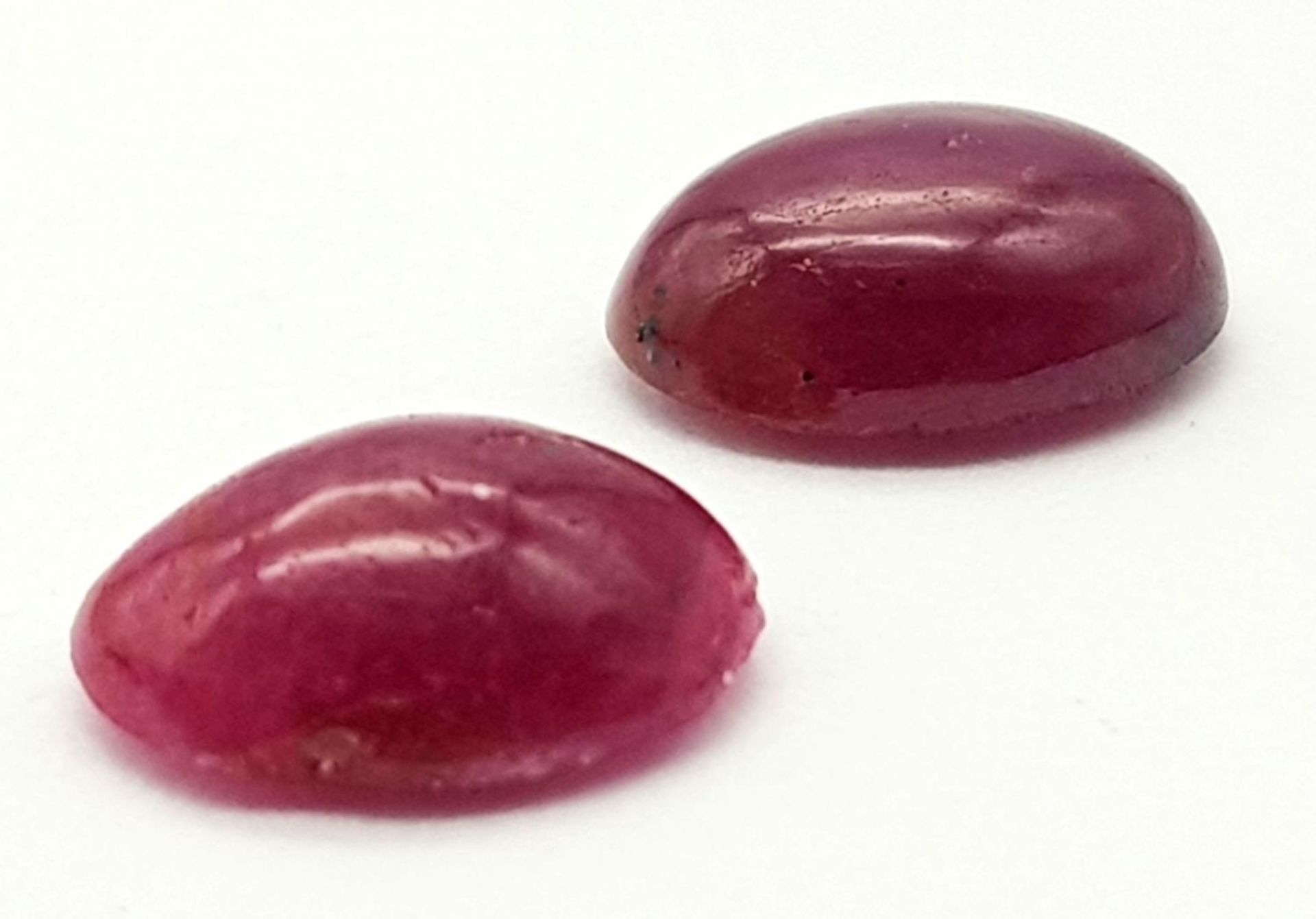 A PAIR OF CABOCHON RUBIES 3.06CT 0.63g A/S 1031