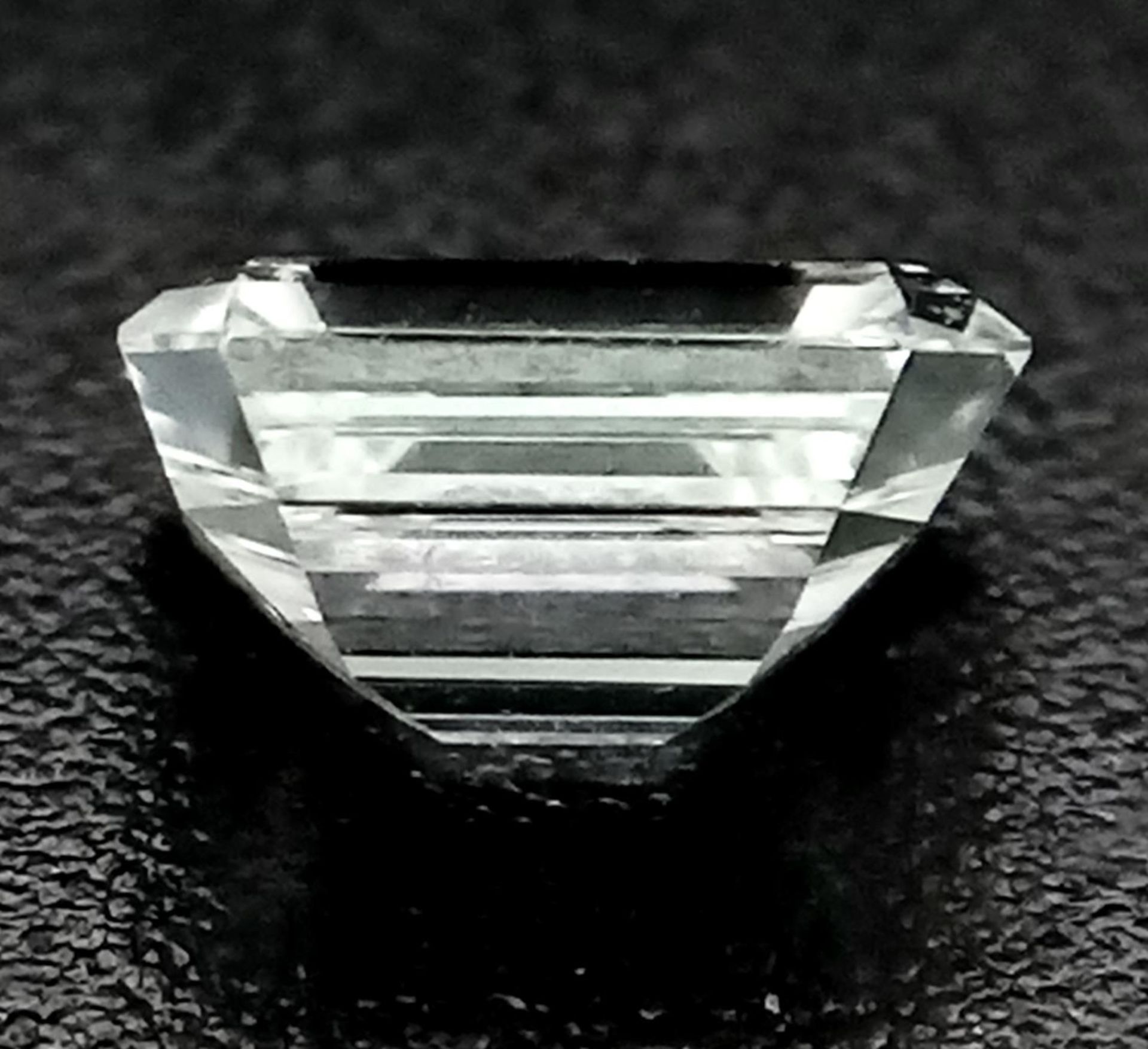 A 0.725ct Emerald Cut Diamond. VVS2 clarity. H colour. Comes with a DIA certificate. - Image 5 of 8