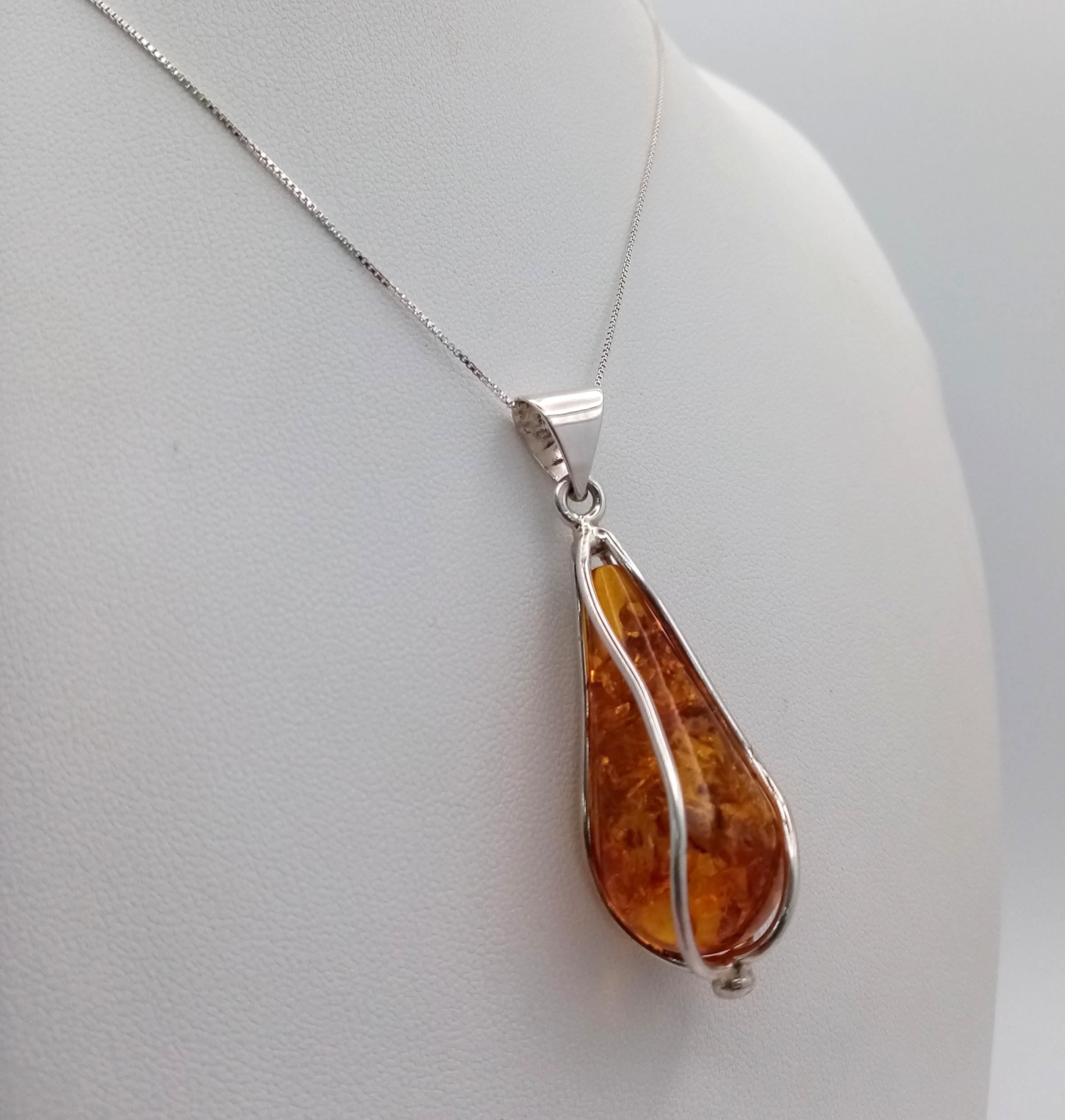 An Unworn, Fully Certified Limited Edition (1 of 50), Sterling Silver and Baltic Cognac Amber