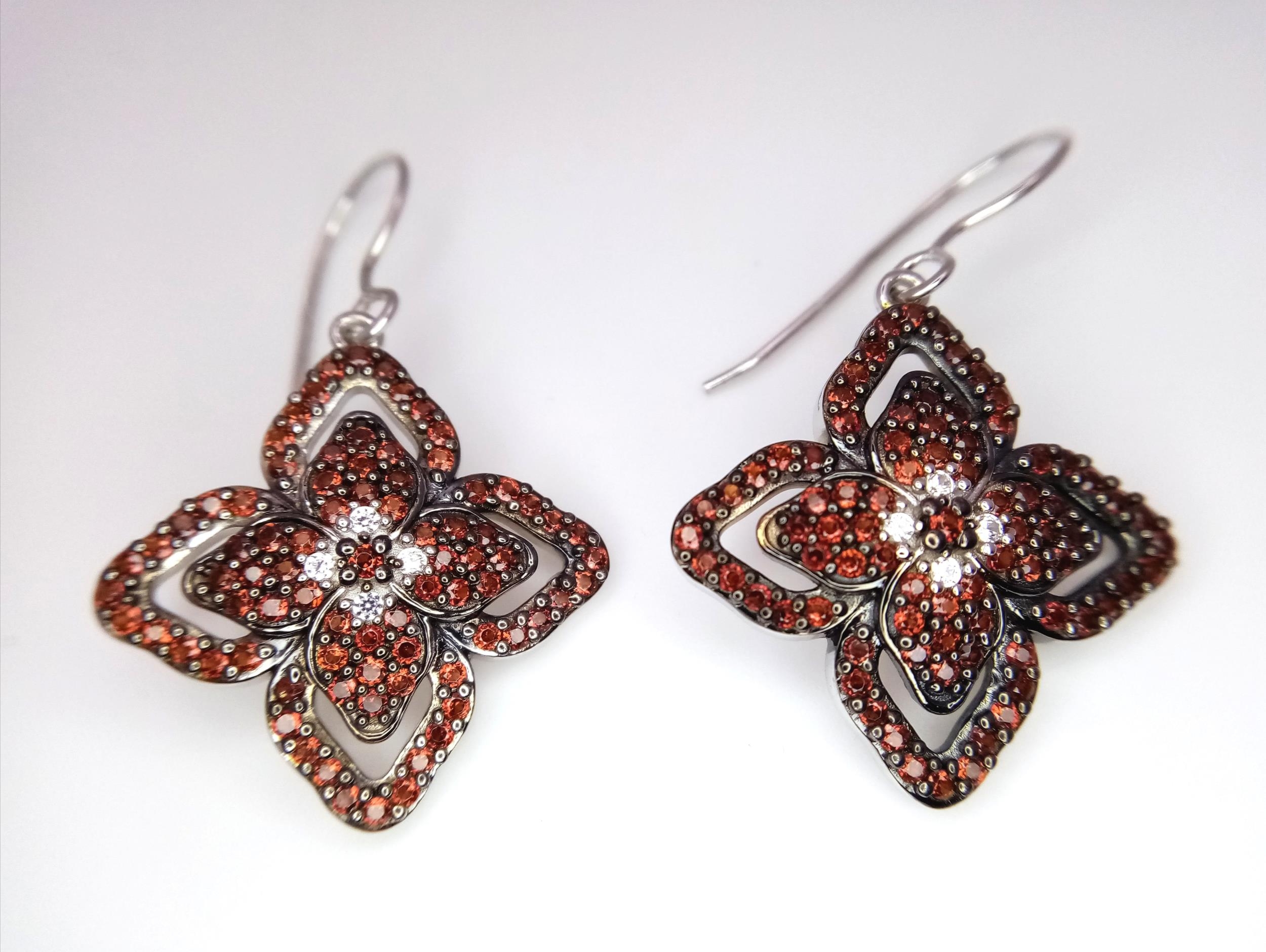 A Stunning Pair of Unworn, Fully Certified Limited Edition (1 of 40,) Sterling Silver Anthill Garnet