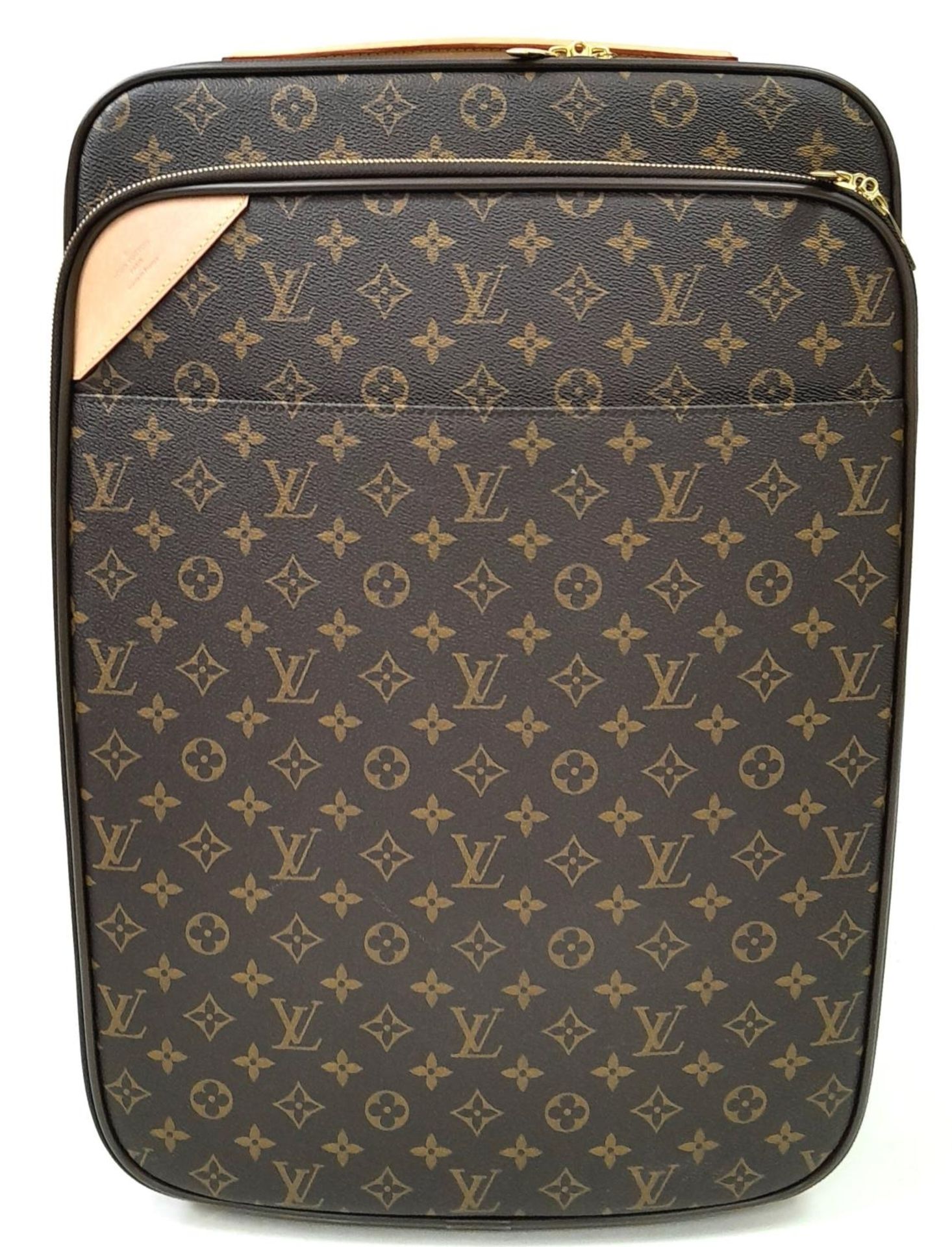 A Louis Vuitton Monogram Pegase Suitcase. Durable leather exterior with gold-toned hardware. Front