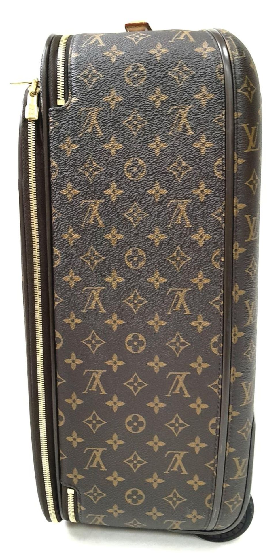 A Louis Vuitton Monogram Pegase Suitcase. Durable leather exterior with gold-toned hardware. Front - Image 2 of 16