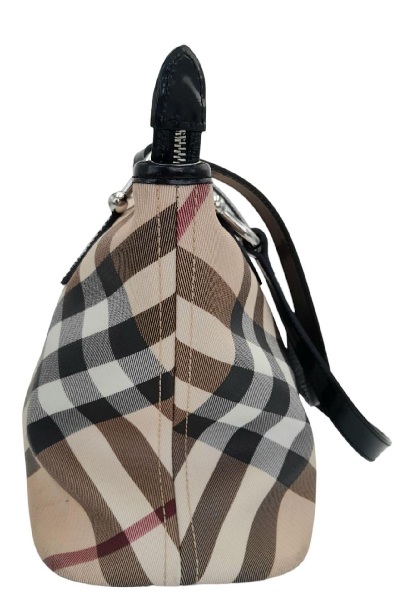 A Burberry Beige Check Nova Bag. Coated canvas exterior with leather trim, two leather straps, - Image 3 of 13