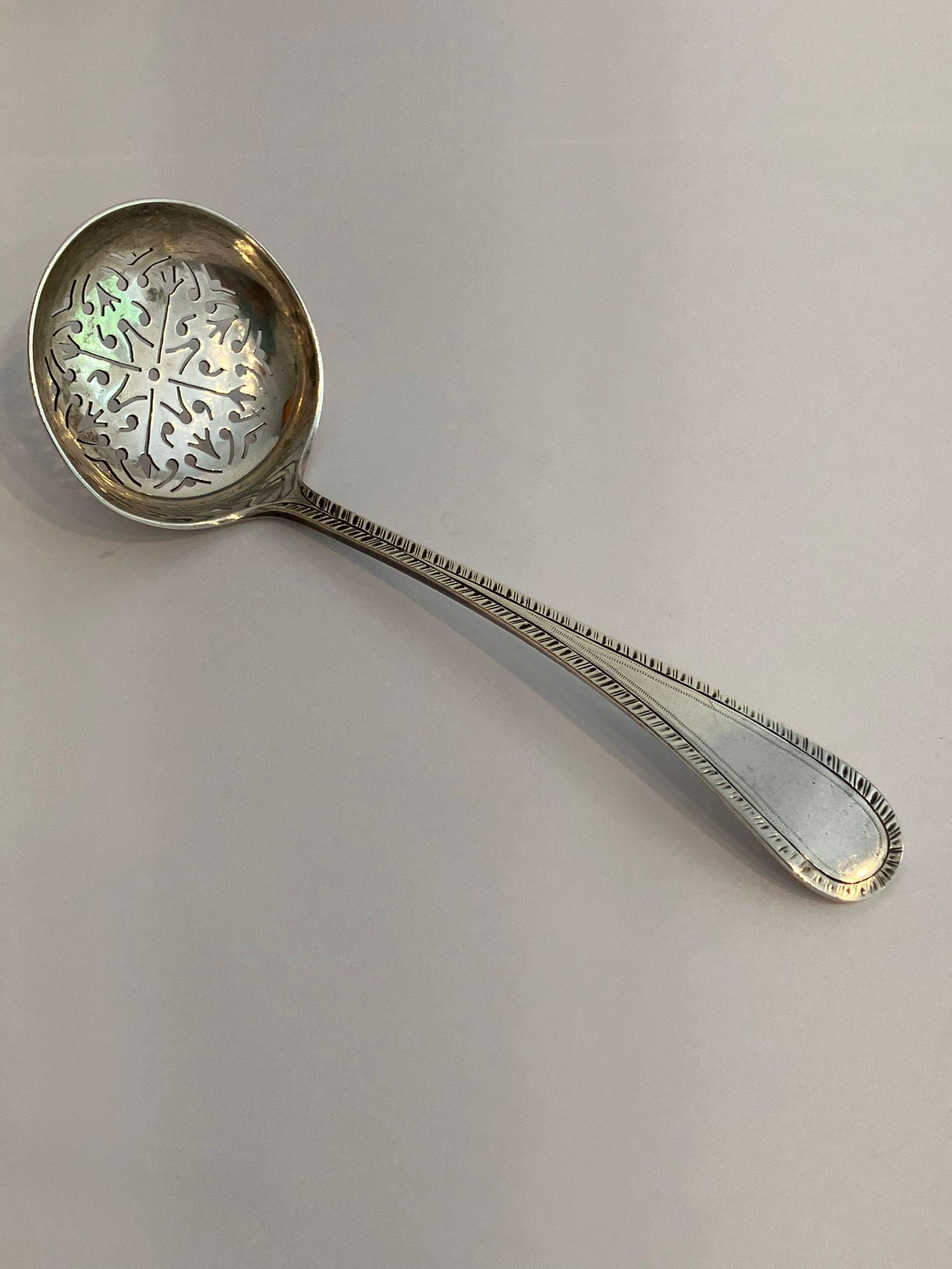 Antique VICTORIAN SILVER SIFTING LADLE. Having a beautiful cut out design to bowl and feather
