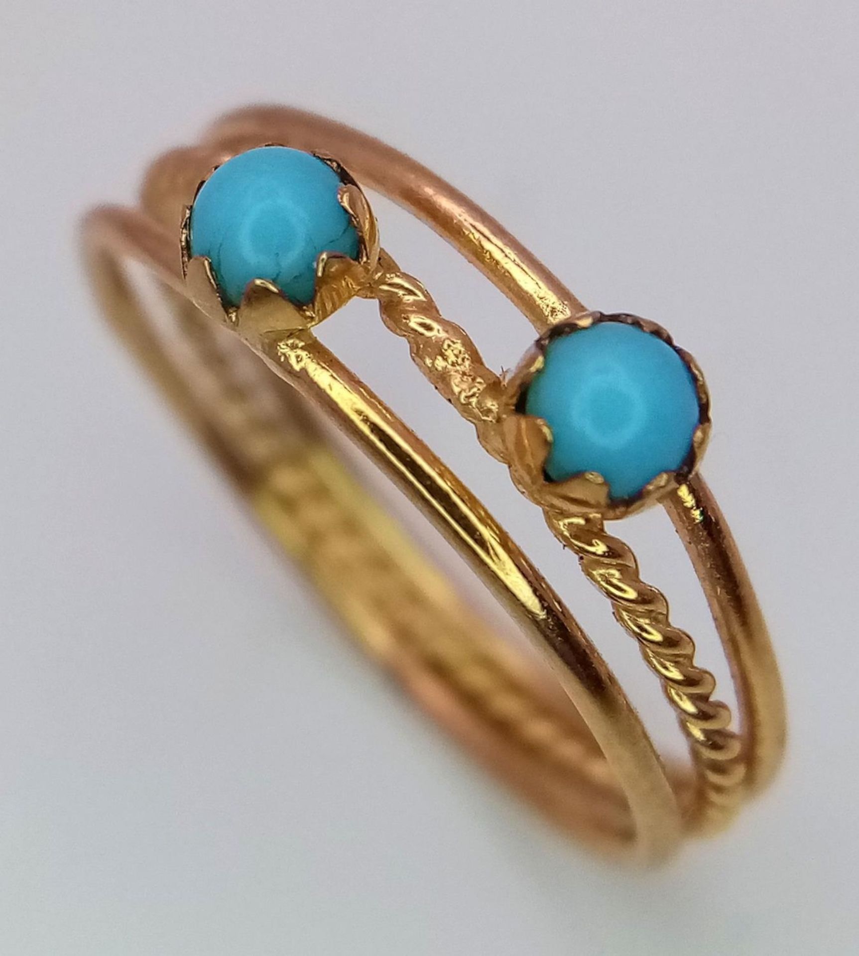 A 16ct Yellow Gold (tested as) Turquoise Band Ring, 4mm turquoise, size I 1/2, 1.6g total weight.